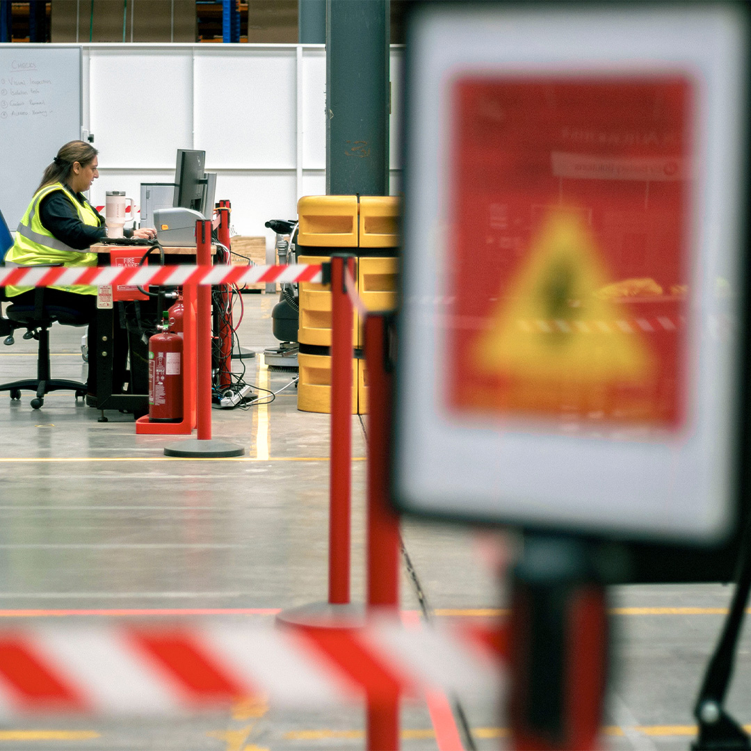 A woman working at a desk at EVBS